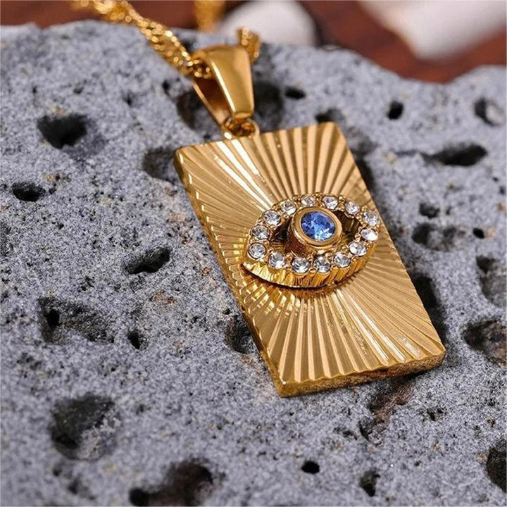 Collana con occhio maligno Olivenorma , topazio blu e zircone bianco 