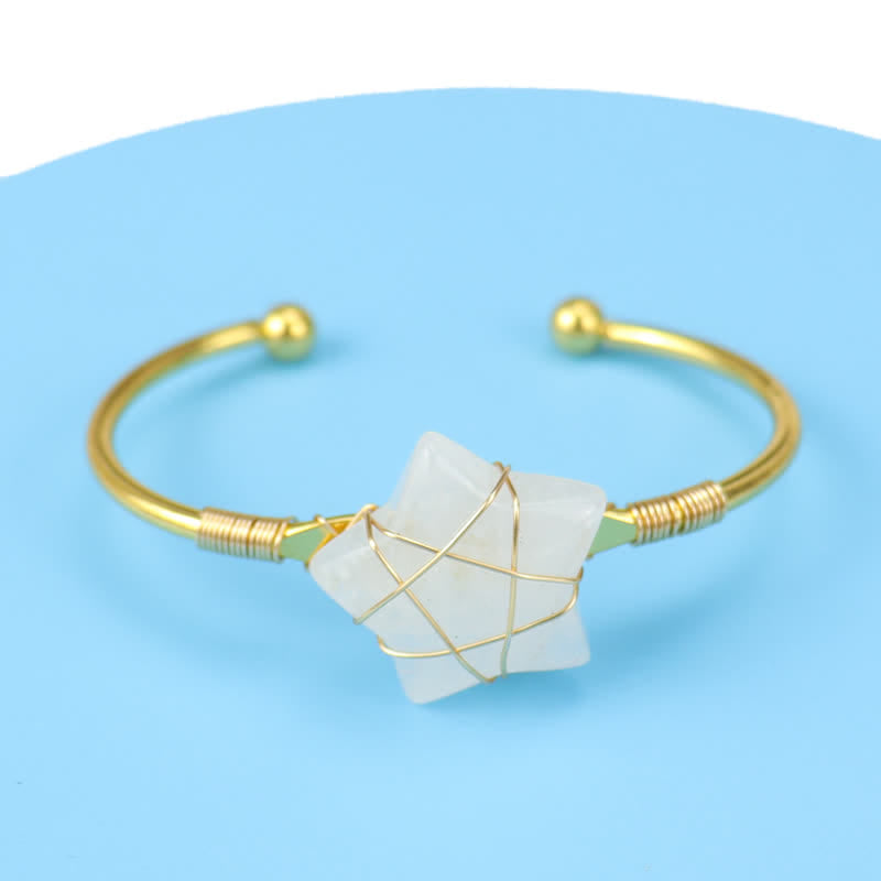 Bracciale Olivenorma con pietre preziose a forma di stella avvolte in filo d'oro