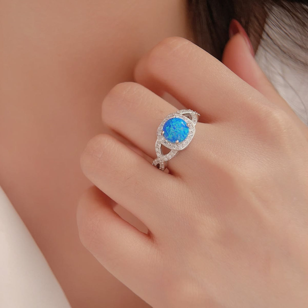 Anello Olivenorma in argento sterling 925 con zircone bianco e opale blu