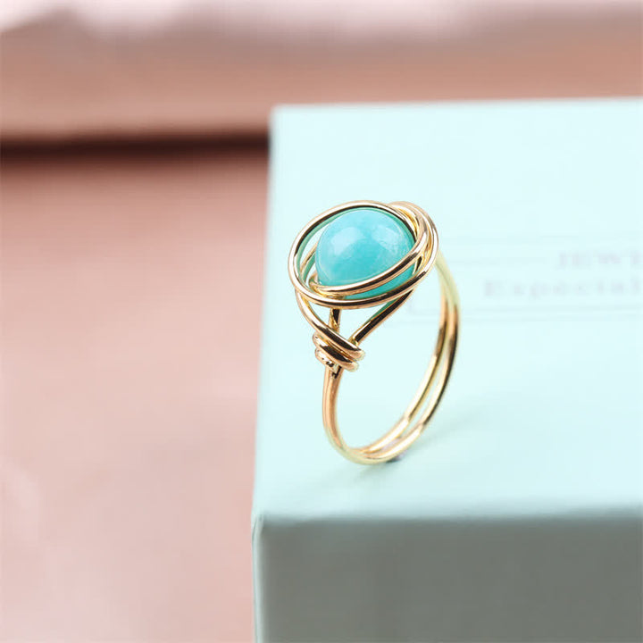 Anello di cristallo curativo avvolto in filo