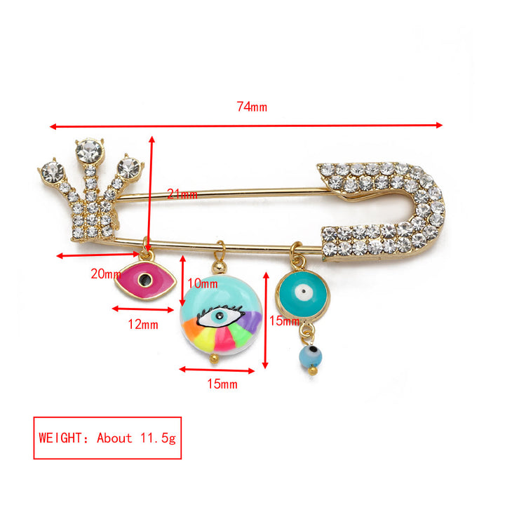 Spilla a forma di cuore con occhio maligno in zircone bianco Olivenorma 