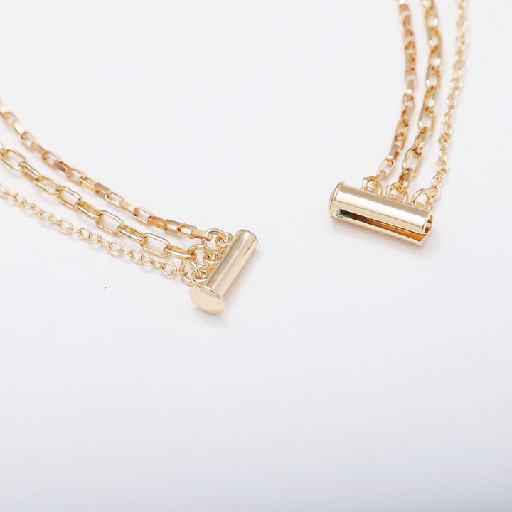 Collana a strati con ciondolo a forma di cuore irregolare in zircone bianco e agata Olivenorma