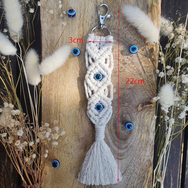 Olivenorma Ornamento con nappa in cotone colorato intrecciato a mano bohémien con occhio maligno