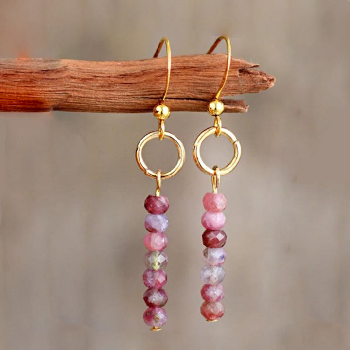 Orecchini con perline di quarzo fragola, agalmatolite, bronzite Olivenorma 