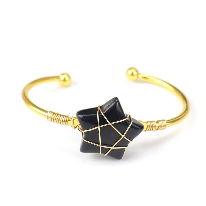 Bracciale Olivenorma con pietre preziose a forma di stella avvolte in filo d'oro