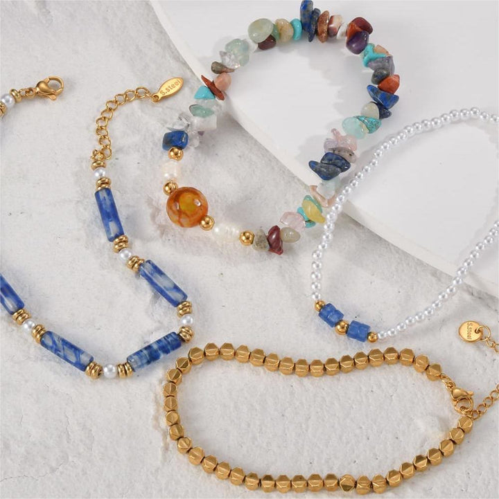 Olivenorma Set di quattro bracciali con perline in cristallo naturale 