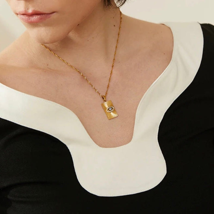 Collana con occhio maligno Olivenorma , topazio blu e zircone bianco 