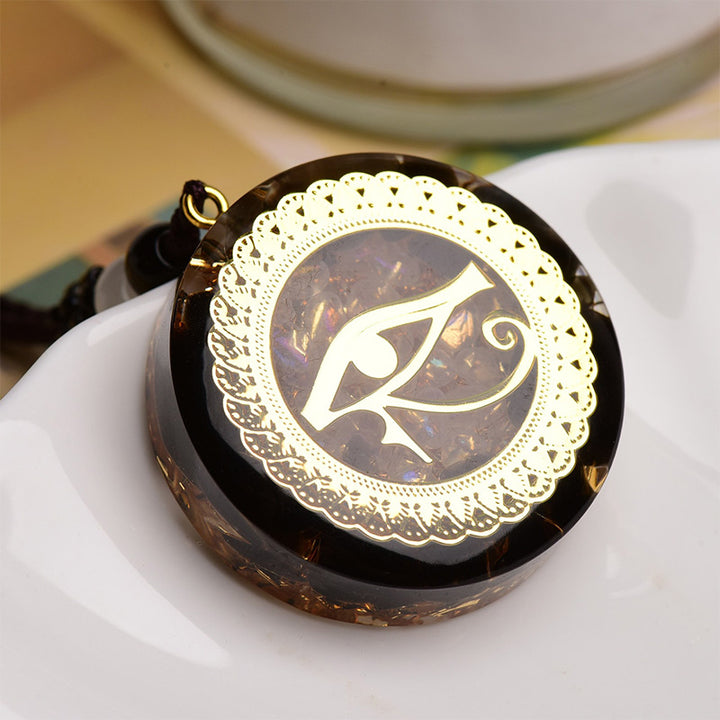 Collana con simbolo dell'occhio di Horus in ossidiana e agata rossa Olivenorma