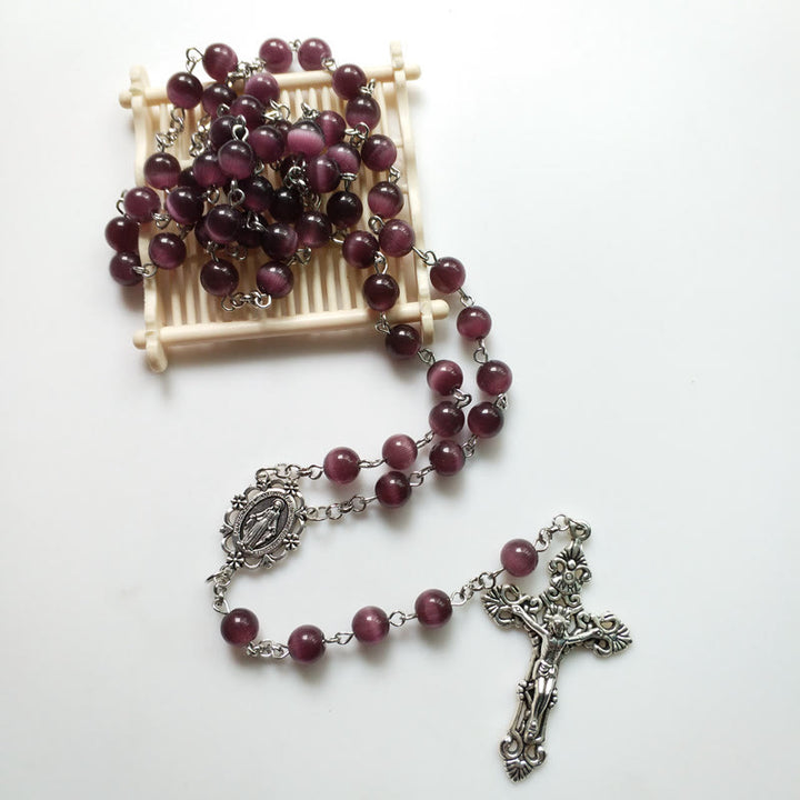 Collana rosario Olivenorma con croce in argento e pietra occhio di gatto viola