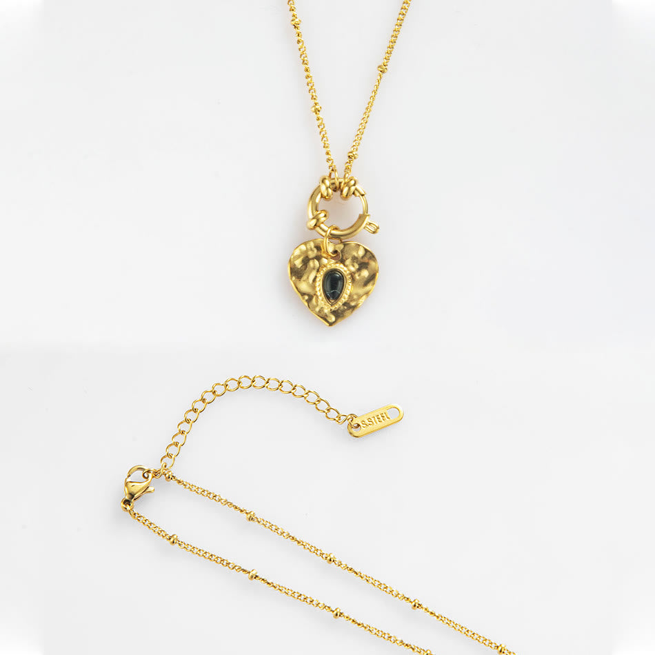 Collana con ciondolo in acciaio al titanio con cuore turchese nero Olivenorma 