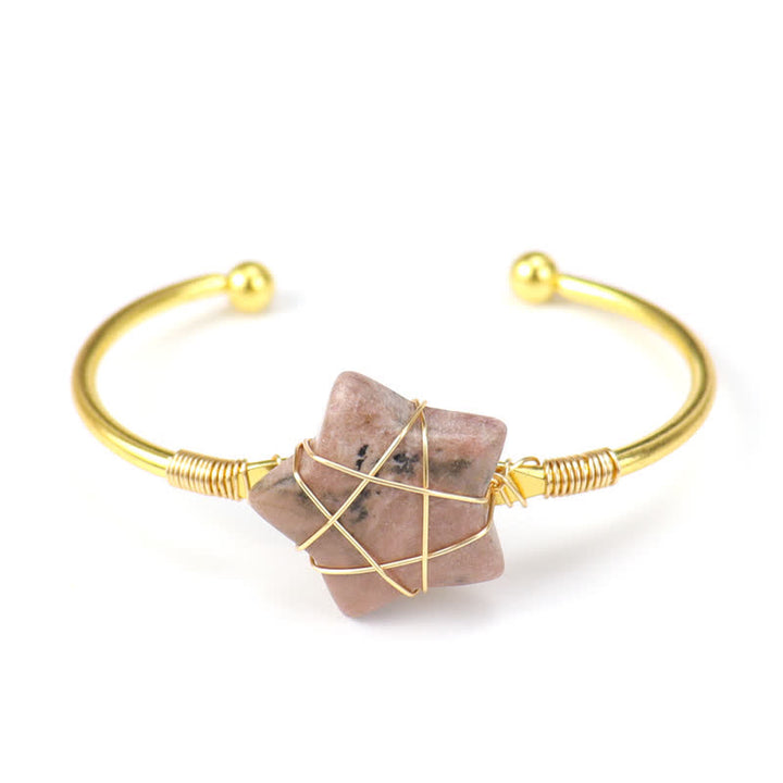 Bracciale Olivenorma con pietre preziose a forma di stella avvolte in filo d'oro