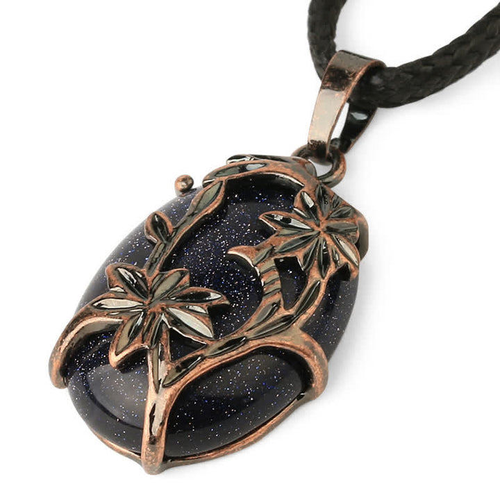 Collana con fiore in ottone e ametista Olivenorma avvolto in cristallo