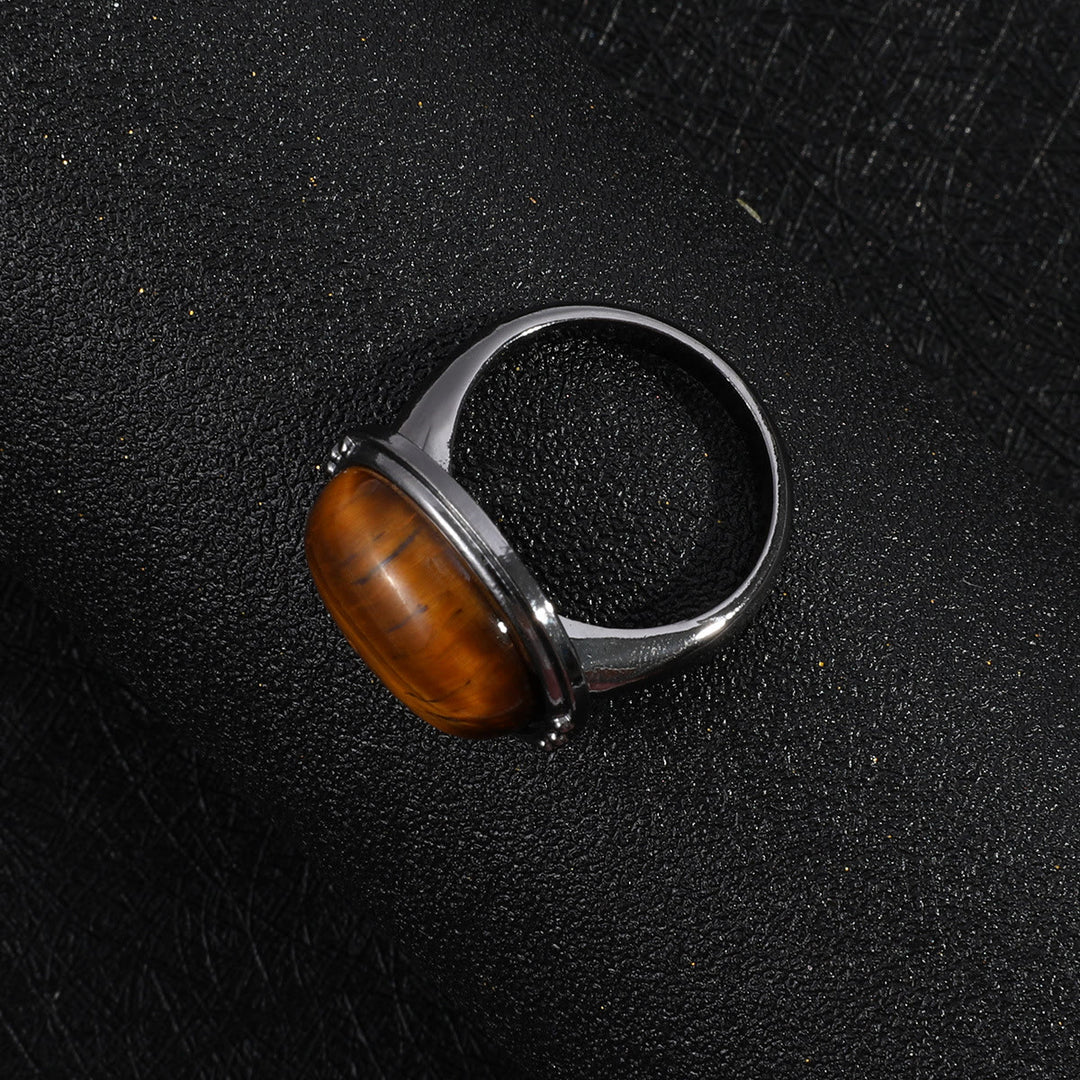 Olivenorma Anello regolabile nero ovale con occhio di tigre