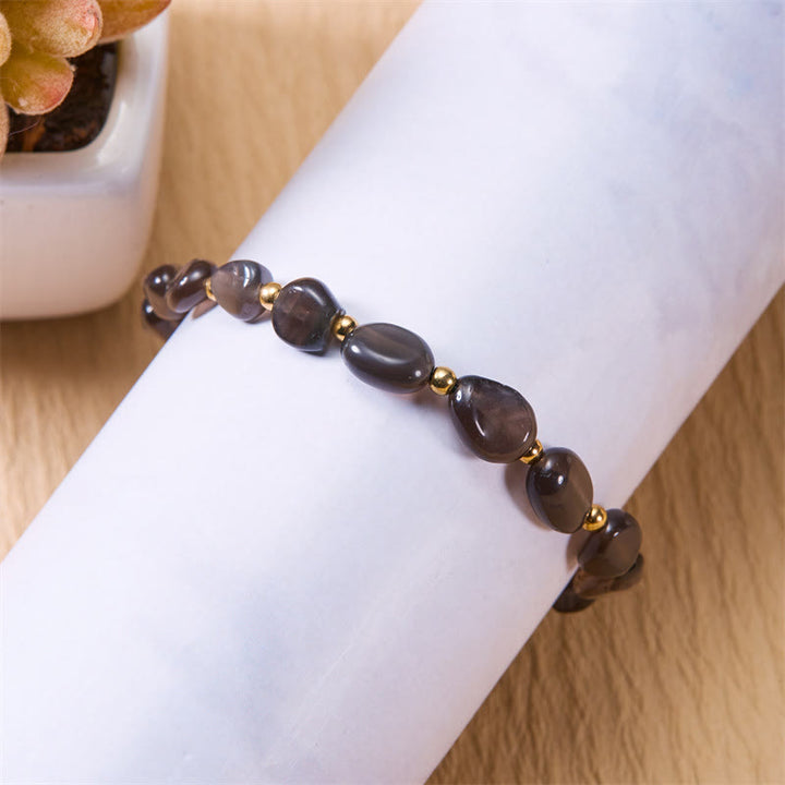 Bracciale intrecciato a mano con perline di pietra naturale irregolare Olivenorma