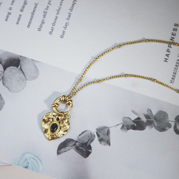 Collana con ciondolo in acciaio al titanio con cuore turchese nero Olivenorma 