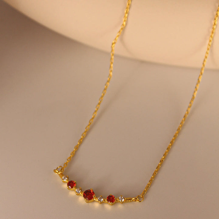 Collana Olivenorma "Simbolo dell'Indipendenza" con granato e diamanti