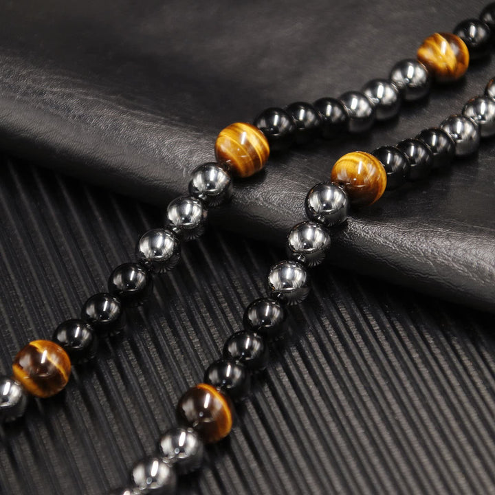 Collana di perle di ematite, occhio di tigre, ossidiana e cristallo curativo Olivenorma