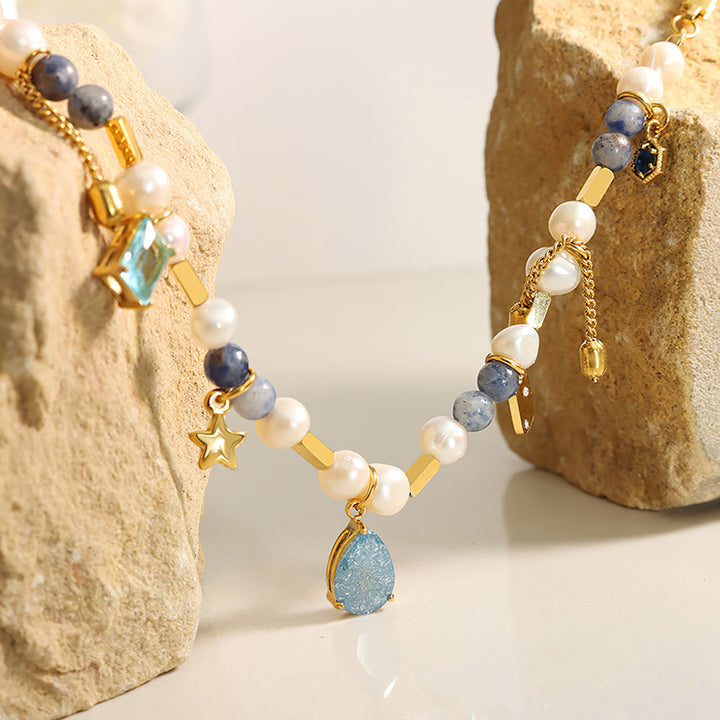 Collana con ciondolo a forma di stella con perle di acquamarina Olivenorma