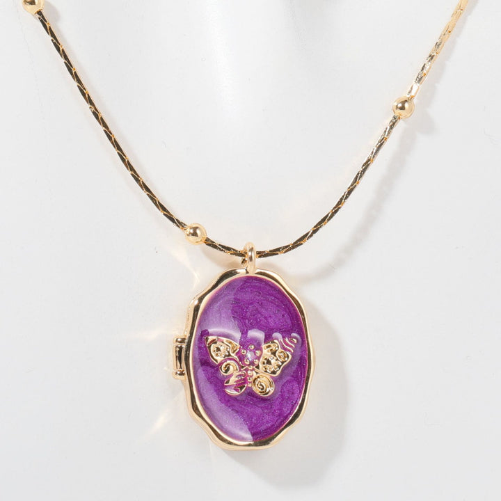 Collana con pendente a farfalla in madreperla Olivenorma in rame placcato oro 14k 