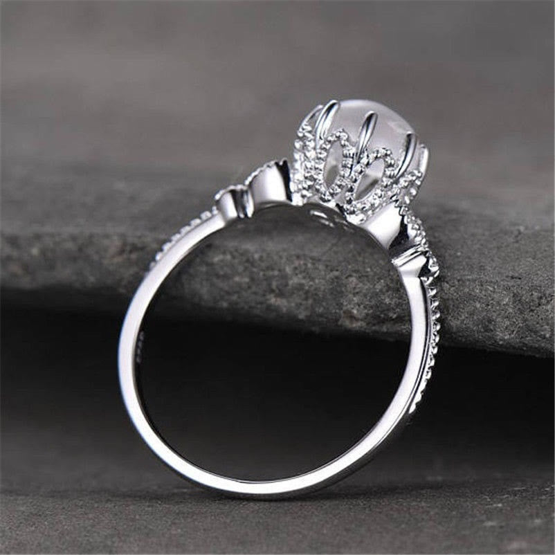 Anello Olivenorma con pietra di luna rotonda e opale e zircone bianco 