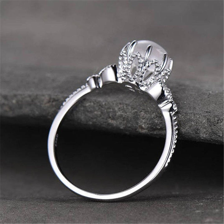Anello Olivenorma con pietra di luna rotonda e opale e zircone bianco 