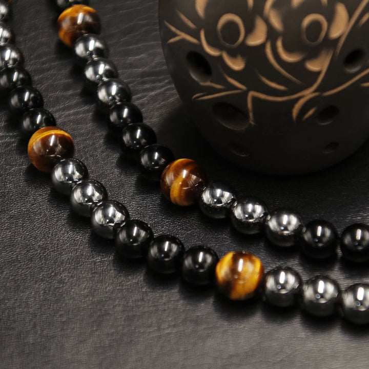 Collana di perle di ematite, occhio di tigre, ossidiana e cristallo curativo Olivenorma