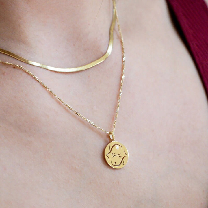 Collana Olivenorma in acciaio inossidabile con cerchio vuoto in zircone bianco e zodiaco 