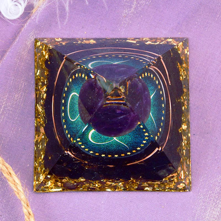 Sfera di ametista Olivenorma con piramide di orgone dello zodiaco del Toro in ossidiana 