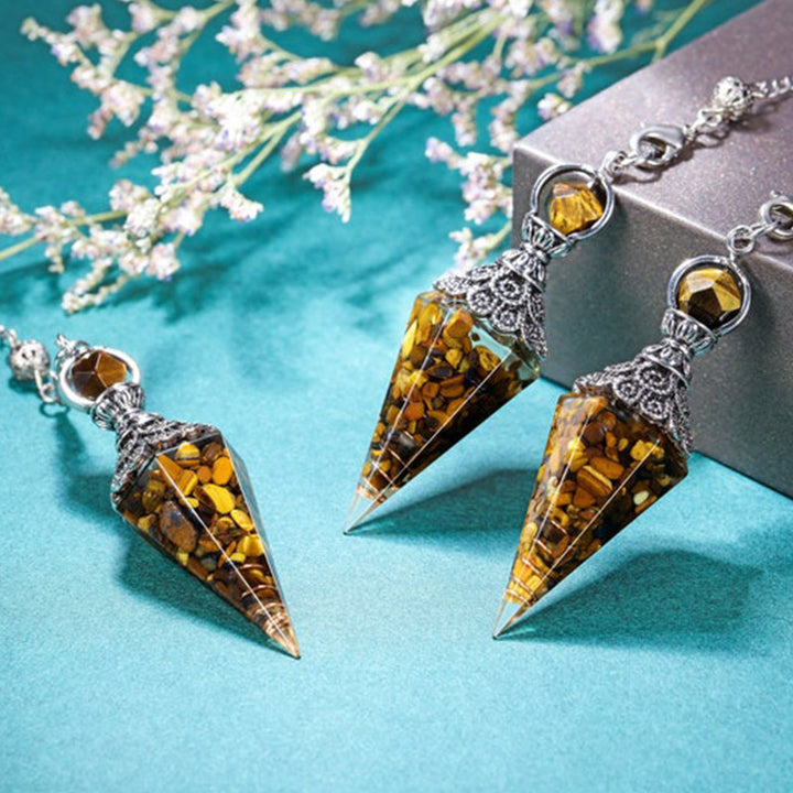 Protezione dell'occhio di tigre e pendolo di potenza 