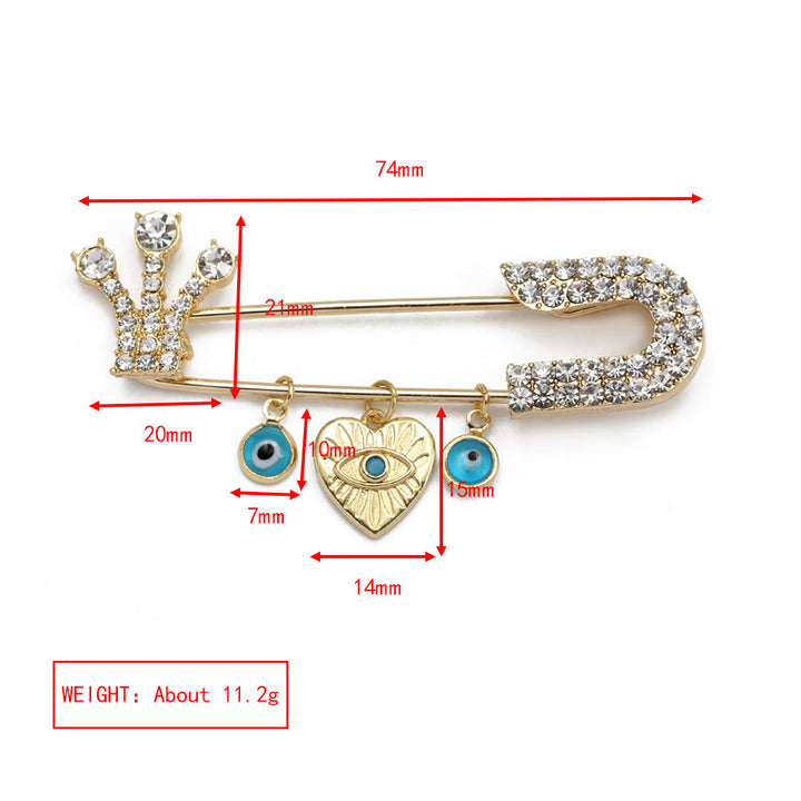 Spilla a forma di cuore con occhio maligno in zircone bianco Olivenorma 