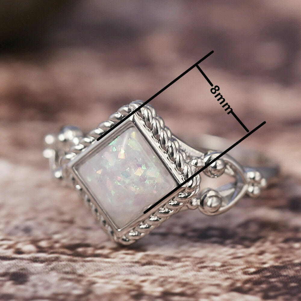 Anello in opale di fuoco taglio ovale Olivenorma