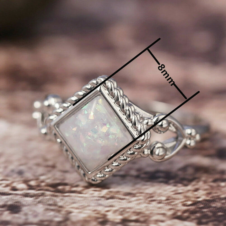 Anello in opale di fuoco taglio ovale Olivenorma