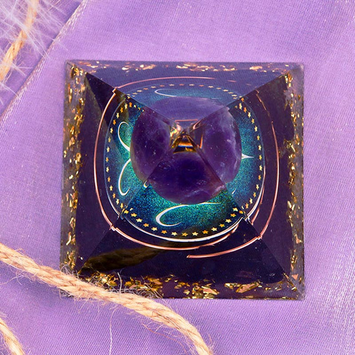 Sfera di ametista Olivenorma con piramide di orgone dello zodiaco Ariete in ossidiana 