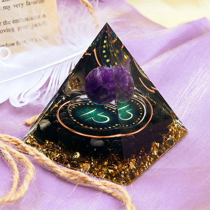 Sfera di ametista Olivenorma con piramide di orgone dello zodiaco Bilancia in ossidiana 