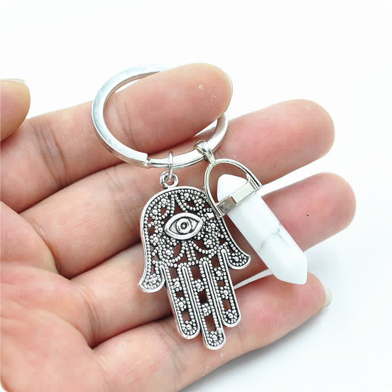 Olivenorma Portachiavi in cristallo con mano di Hamsa ispiratrice