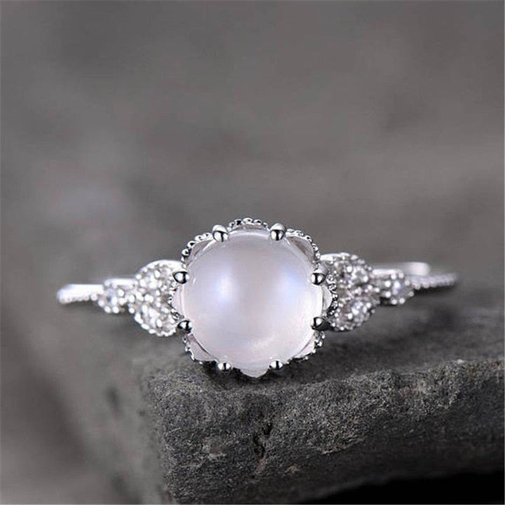 Anello Olivenorma con pietra di luna rotonda e opale e zircone bianco 