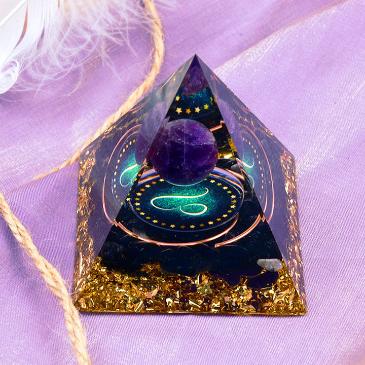 Sfera di ametista Olivenorma con piramide di orgone dello zodiaco Leone in ossidiana 