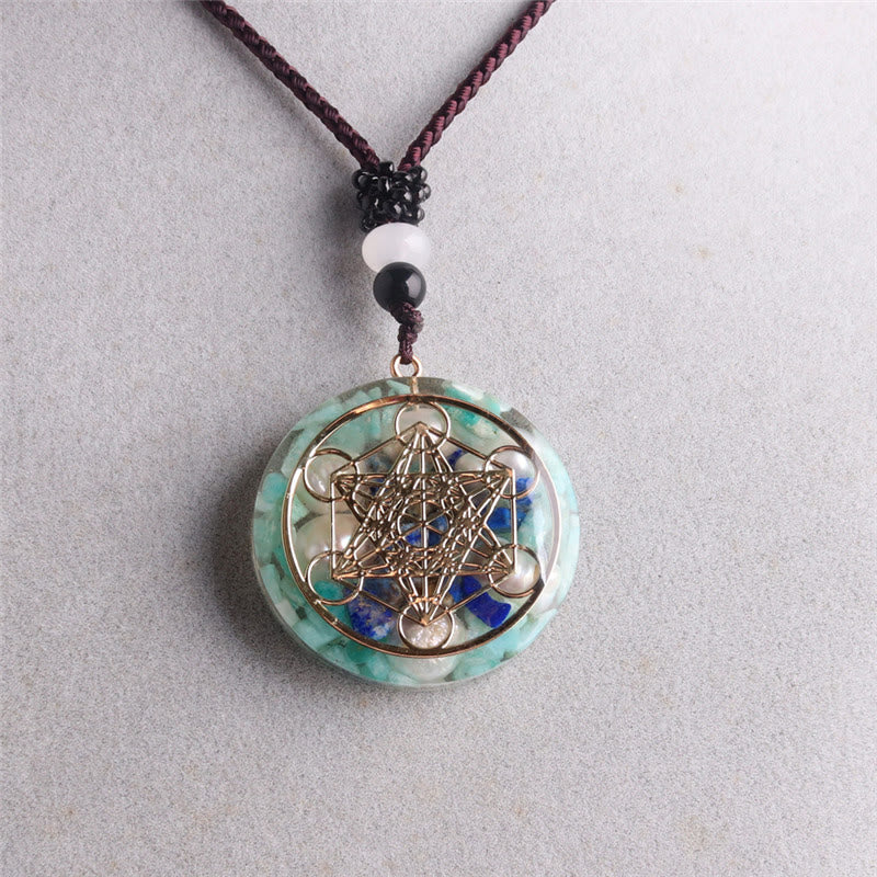 Collana con ciondolo in perla di lapislazzuli e cubo di Metatron in amazzonite Olivenorma