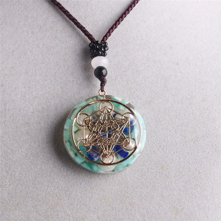 Collana con ciondolo in perla di lapislazzuli e cubo di Metatron in amazzonite Olivenorma