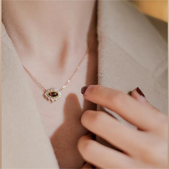 Collana con clavicola in stile palazzo in occhio di tigre naturale Olivenorma