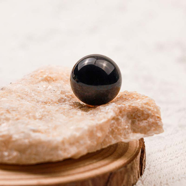 Sfera di cristallo di protezione in ossidiana Olivenorma