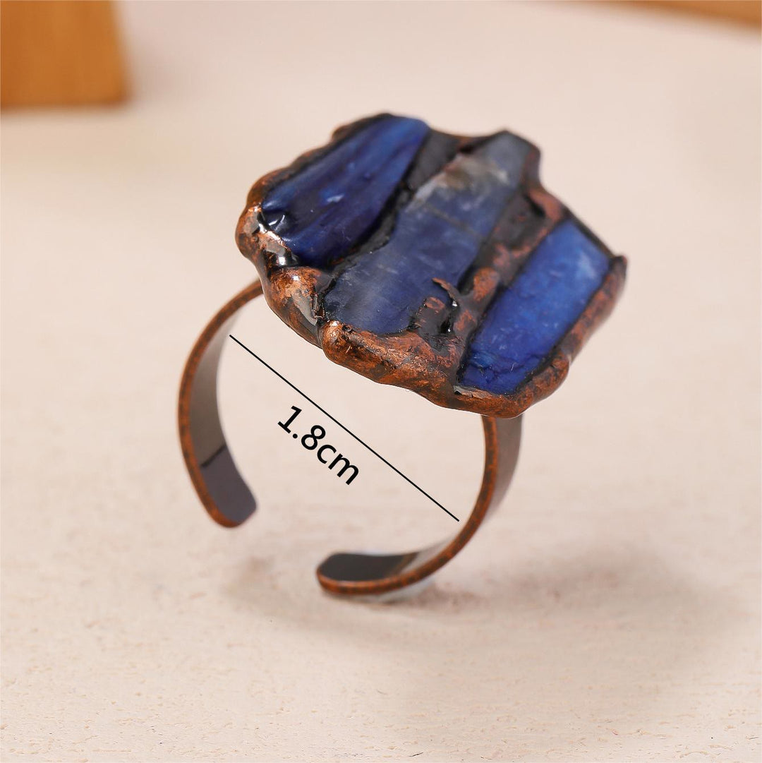 Anello regolabile con apertura irregolare grezza in cianite Olivenorma