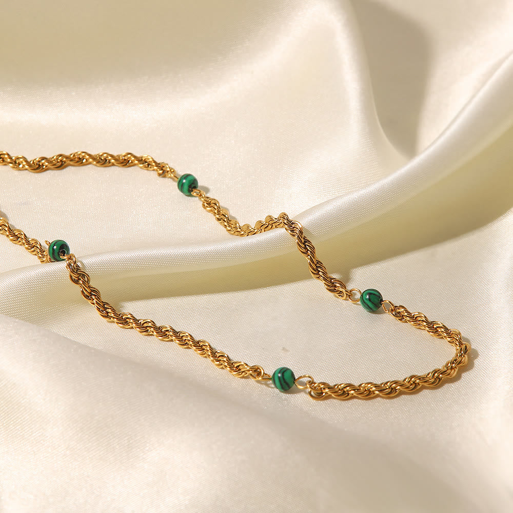 Collana con clavicola intrecciata in perline di malachite naturale Olivenorma 