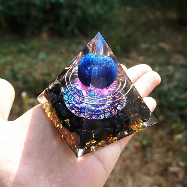 Sfera di lapislazzuli Olivenorma con piramide di orgone di ossidiana 
