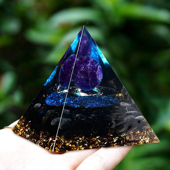 Sfera di ametista Olivenorma con piramide di quarzo blu Reki Orgone 