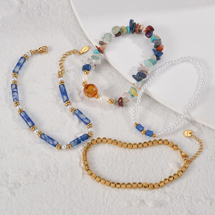 Olivenorma Set di quattro bracciali con perline in cristallo naturale 