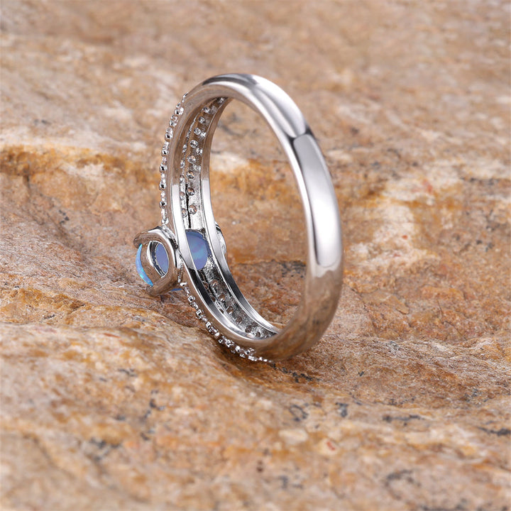 Anello Olivenorma "Shiny Elegance" con fascia in zircone e opale rotondo