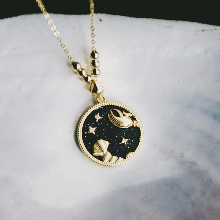 Collana Zodiaco in ascolto in arenaria blu 