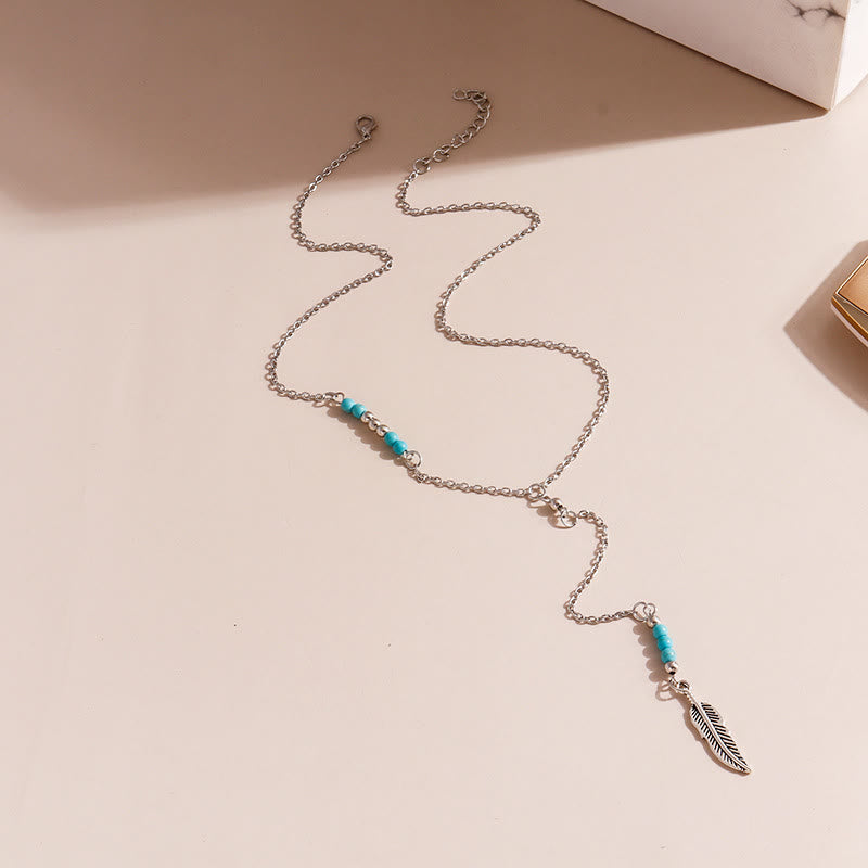 Olivenorma Collana con ciondolo a foglia turchese in argento e oro bohémien