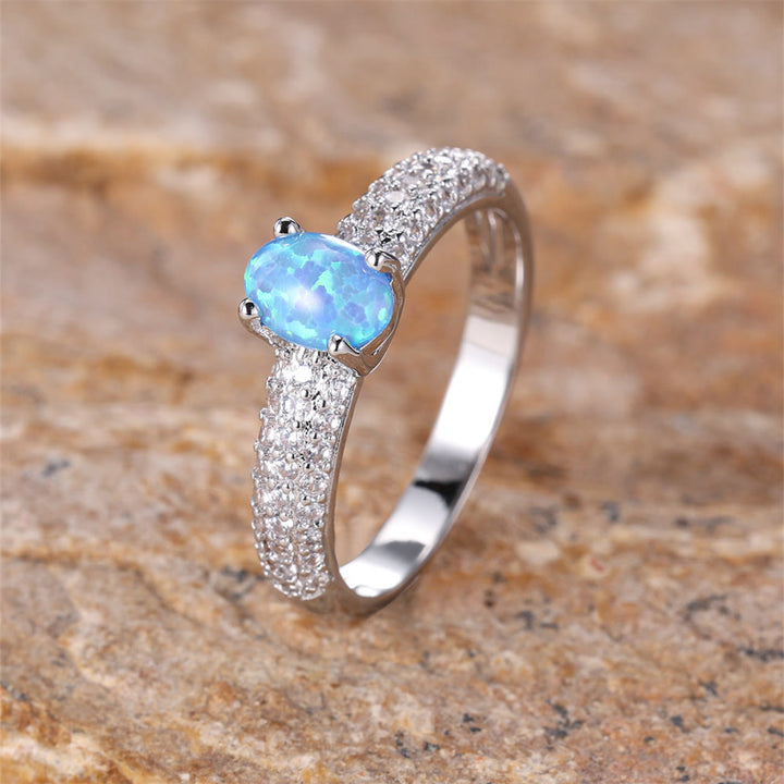 Anello Olivenorma "Shiny Elegance" con fascia in zircone e opale rotondo